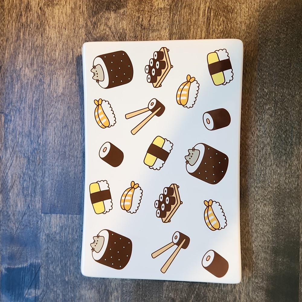 Pusheen the at sushi plate